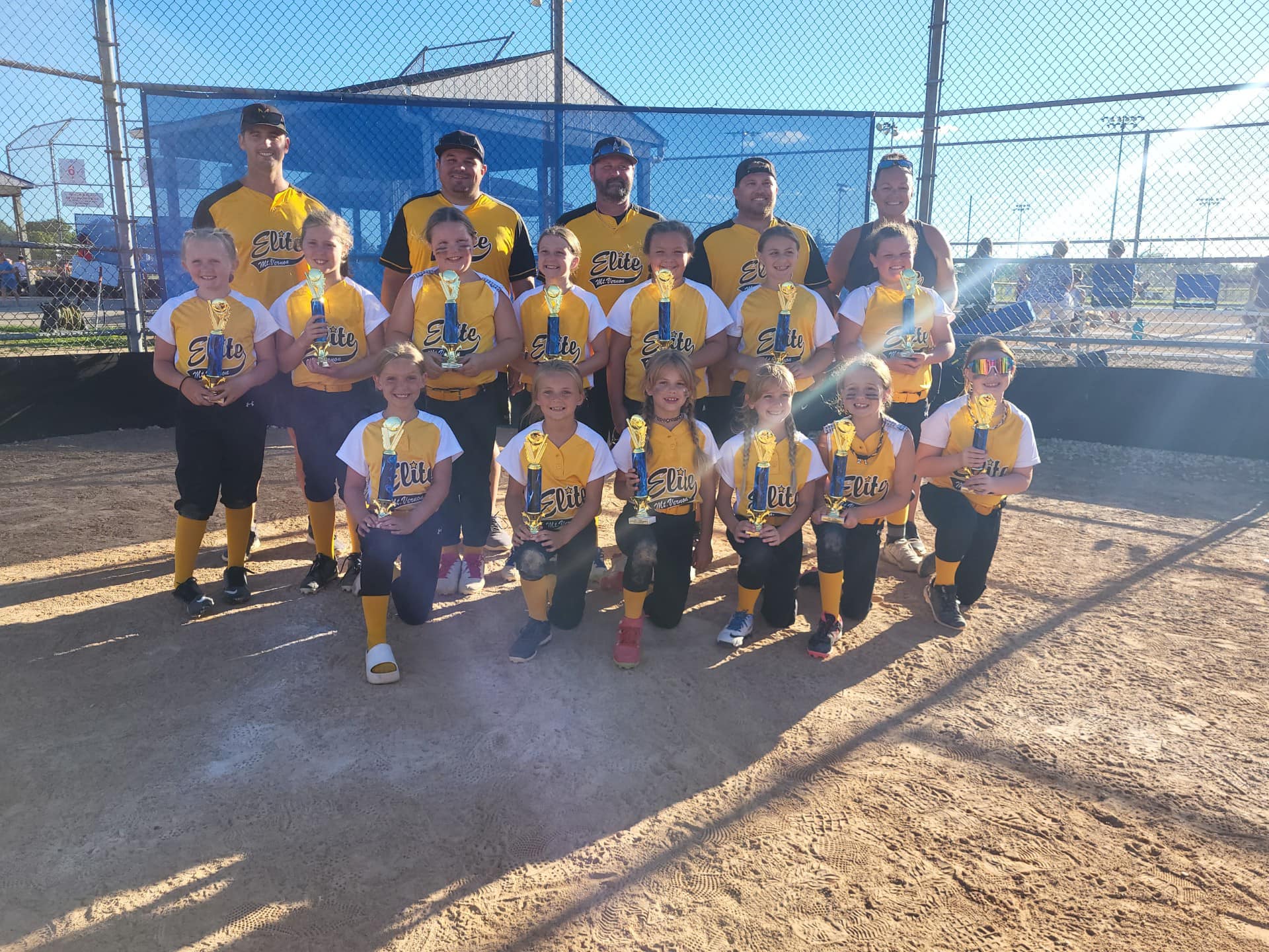 2024 8U softball team celebrating a tournament win